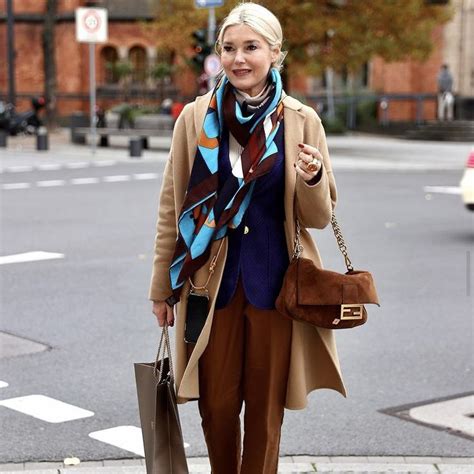 cool ways to wear hermes scarf|Hermes scarf street style.